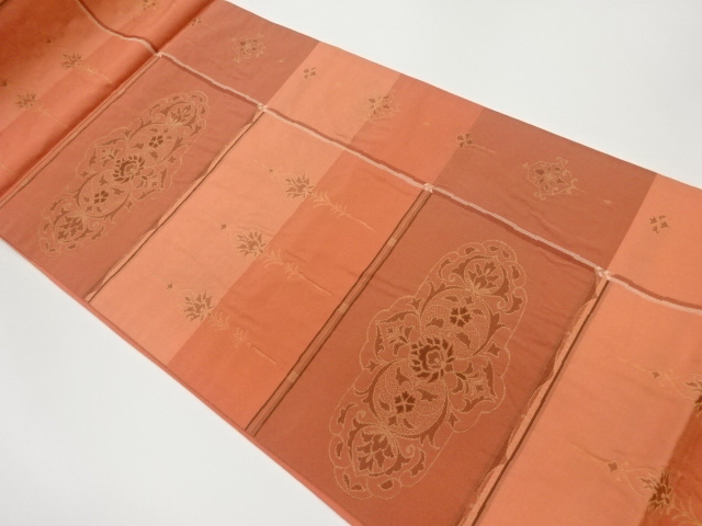 横段に抽象花模様織出し袋帯